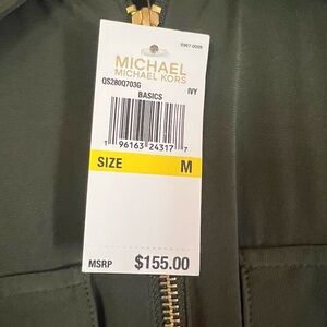 Michael Kors green jump suit with pockets